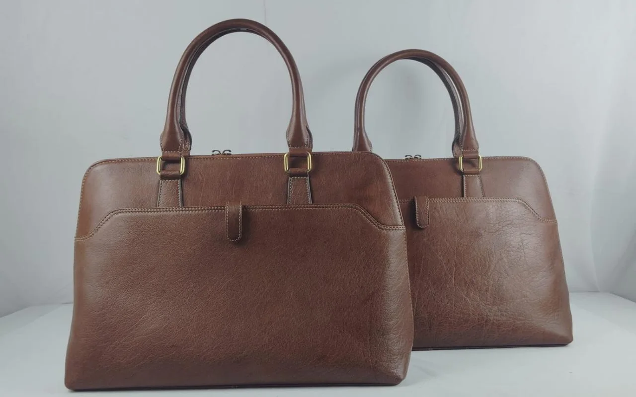 Two tan leather twin-handle workbags from the Revati Craft wholesale range